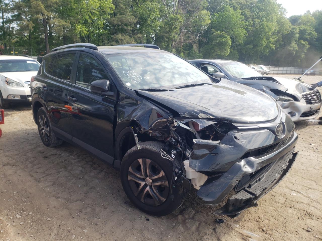 Photo 14 from auction – 2018 TOYOTA RAV4 LE with VIN 2T3ZFREV7JW480033