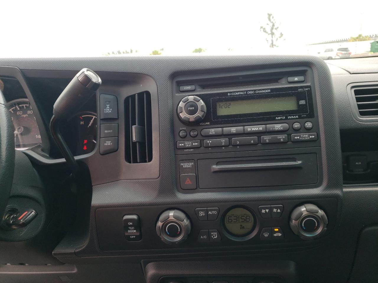Photo 9 from auction – 2010 HONDA RIDGELINE with VIN 5FPYK1F56AB007759