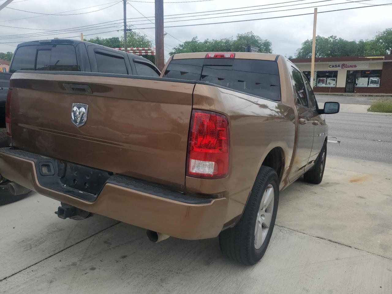 Photo 4 from auction – 2011 DODGE RAM 1500 with VIN 1D7RB1CT0BS654930