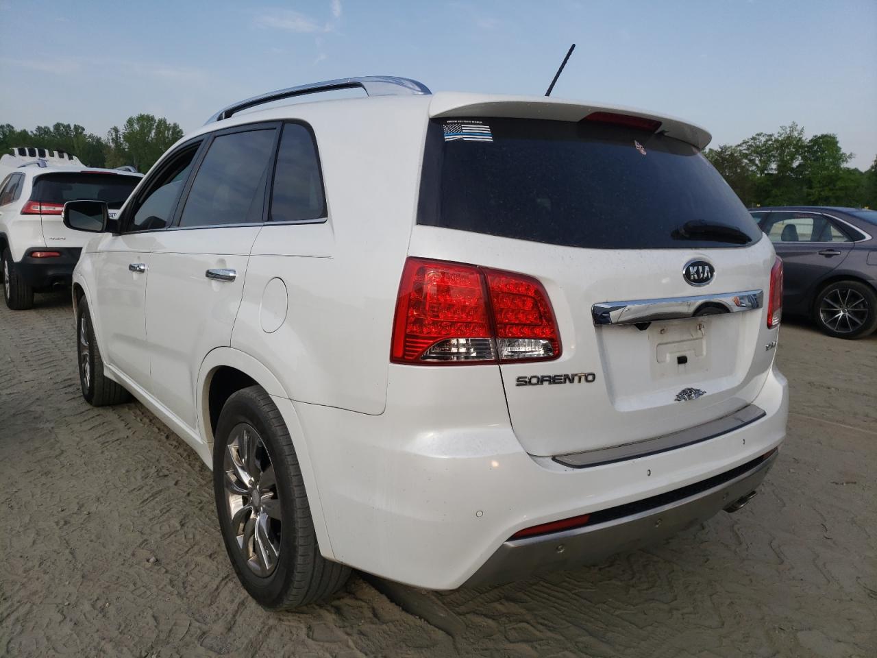 Photo 3 from auction – 2012 KIA SORENTO SX with VIN 5XYKW4A27CG273045