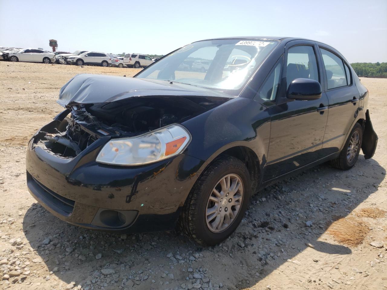 Photo 2 from auction – 2013 SUZUKI SX4 LE with VIN JS2YC5A30D6101094