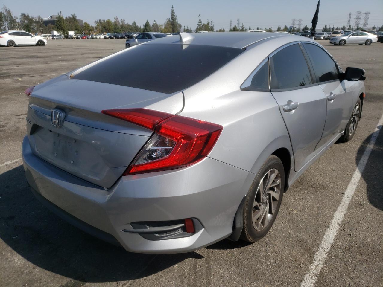 Photo 4 from auction – 2017 HONDA CIVIC EX with VIN 2HGFC2F7XHH528252
