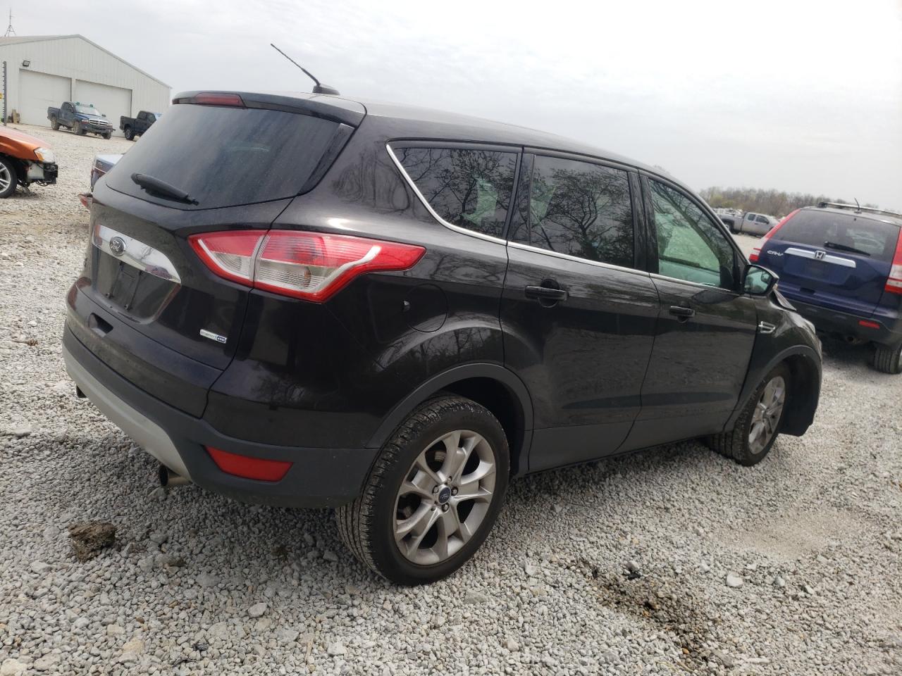 Photo 4 from auction – 2013 FORD ESCAPE SEL with VIN 1FMCU9HX2DUB38799