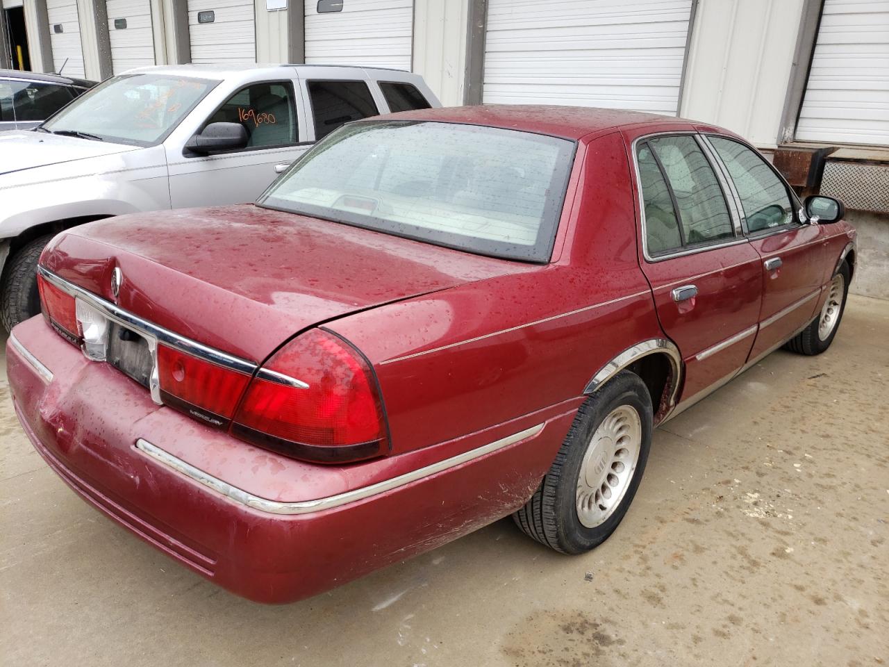 Photo 4 from auction – 2002 MERCURY GRAND MARQ with VIN 2MEFM75W82X640402