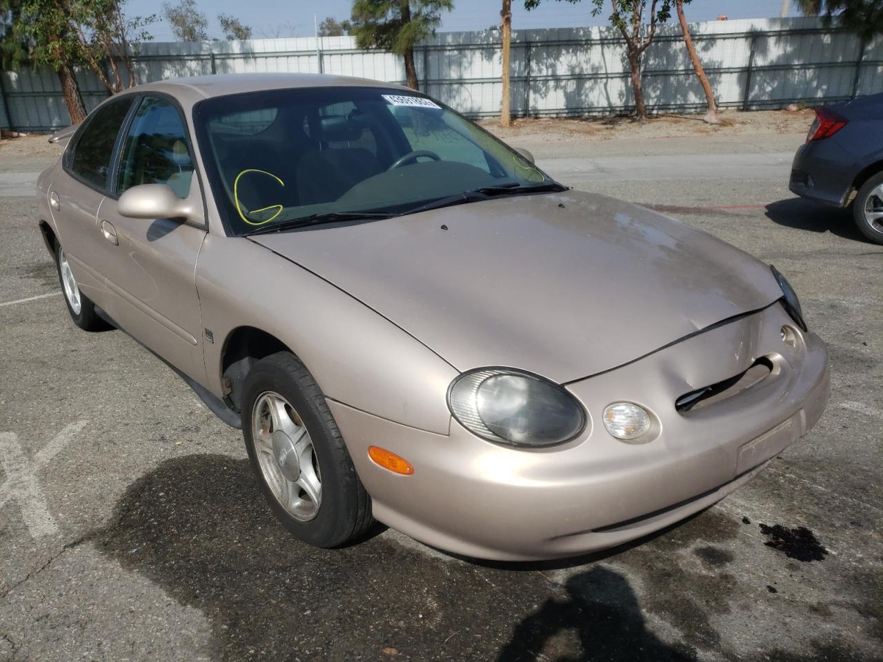 FORD TAURUS SE 1999 with VIN 1FAFP53S3XA222106 - Photo from auction