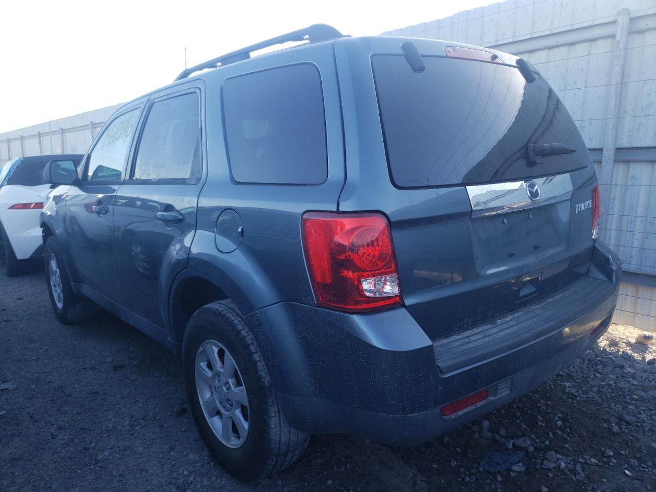 Photo 3 from auction – 2010 MAZDA TRIBUTE I with VIN 4F2CY0C75AKM07557
