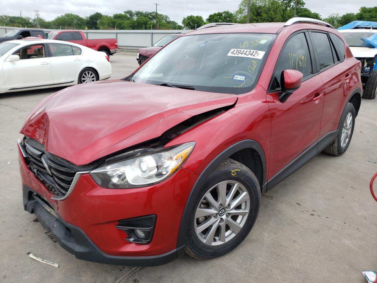 Photo 2 from auction – 2016 MAZDA CX-5 TOURI with VIN JM3KE2CY4G0653357