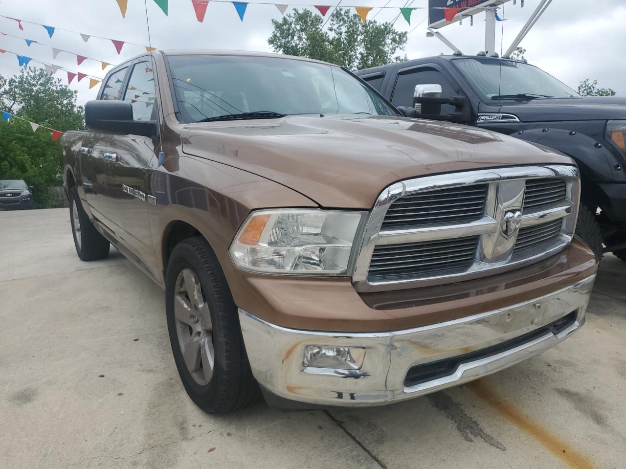DODGE RAM 1500 2011 with VIN 1D7RB1CT0BS654930 - Photo from auction