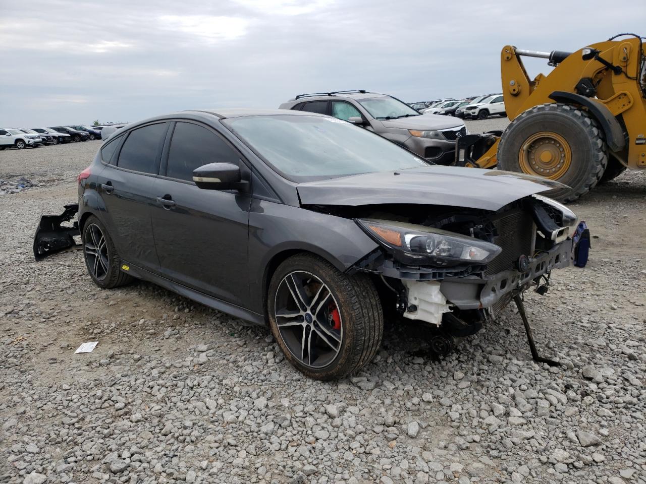 FORD FOCUS ST 2015 with VIN 1FADP3L94FL323750 - Photo from auction