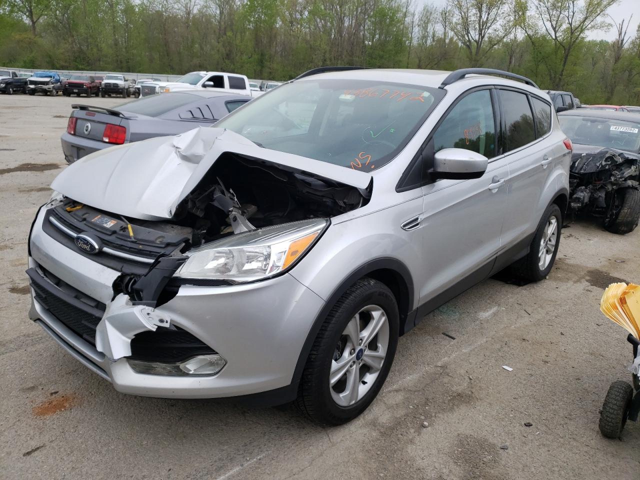 Photo 2 from auction – 2014 FORD ESCAPE SE with VIN 1FMCU0G95EUA68960