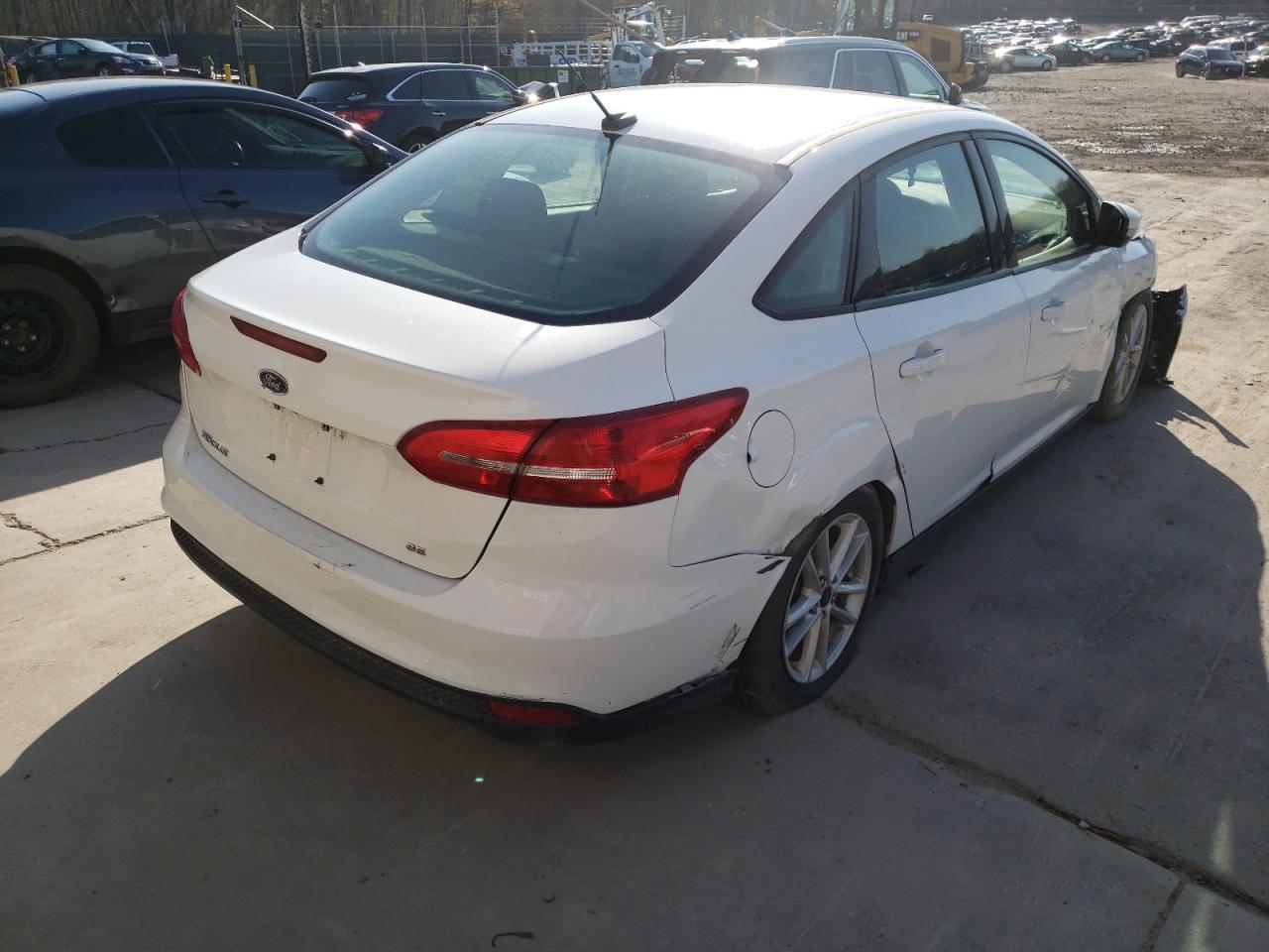 Photo 4 from auction – 2017 FORD FOCUS SE with VIN 1FADP3F28HL326751