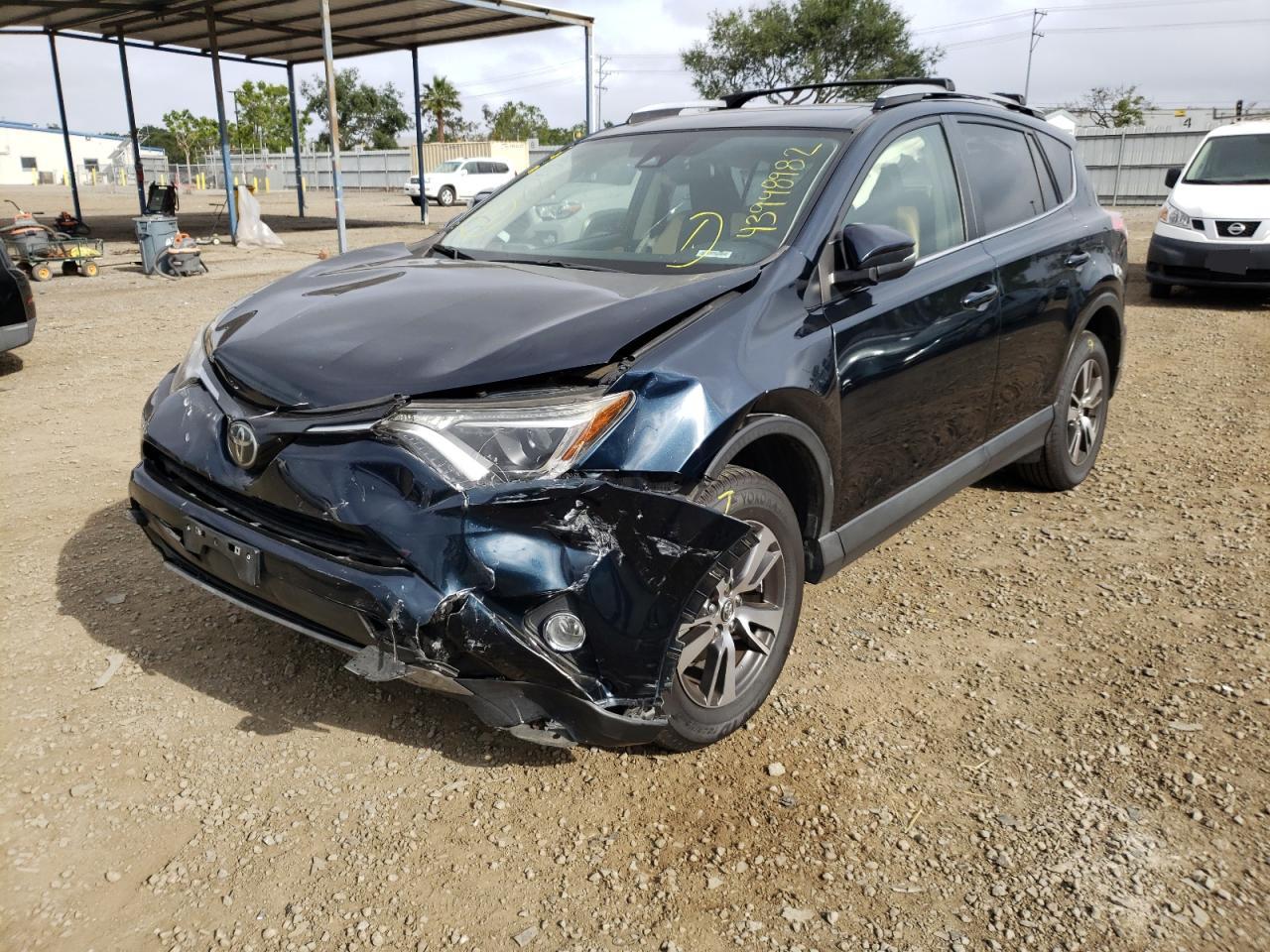 Photo 2 from auction – 2017 TOYOTA RAV4 XLE with VIN JTMWFREV3HD102785