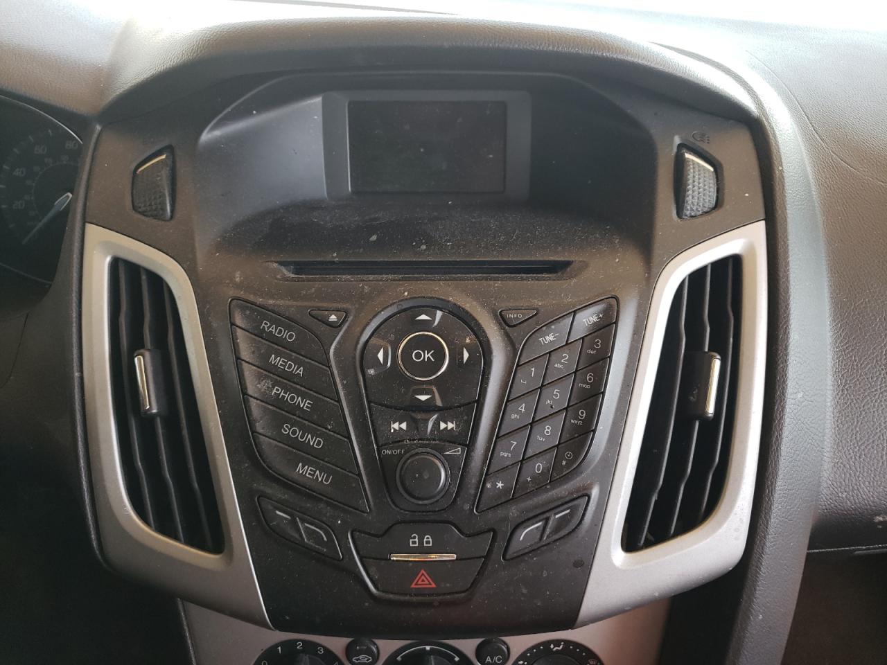 Photo 9 from auction – 2014 FORD FOCUS with VIN 1FADP3F27EL266196