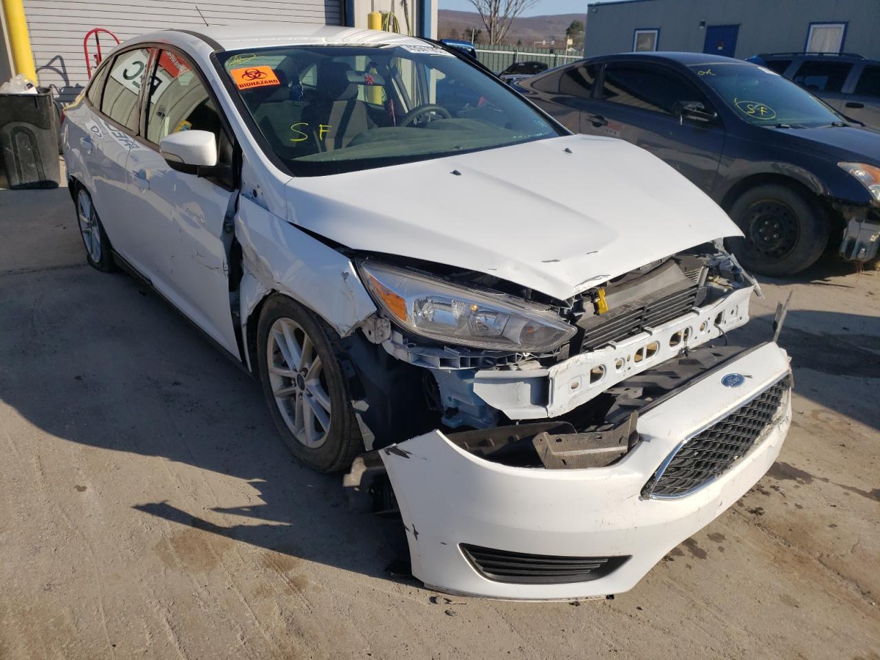FORD FOCUS SE 2017 with VIN 1FADP3F28HL326751 - Photo from auction