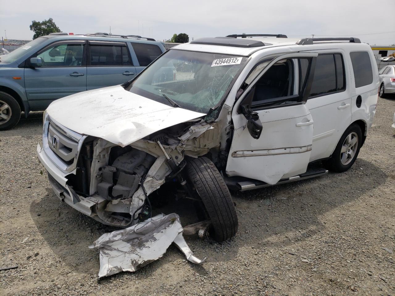 Photo 9 from auction – 2009 HONDA PILOT EXL with VIN 5FNYF385X9B012867