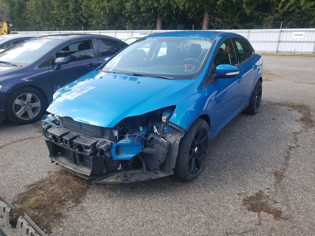 Photo 2 from auction – 2013 FORD FOCUS SE with VIN 1FADP3F28DL138841