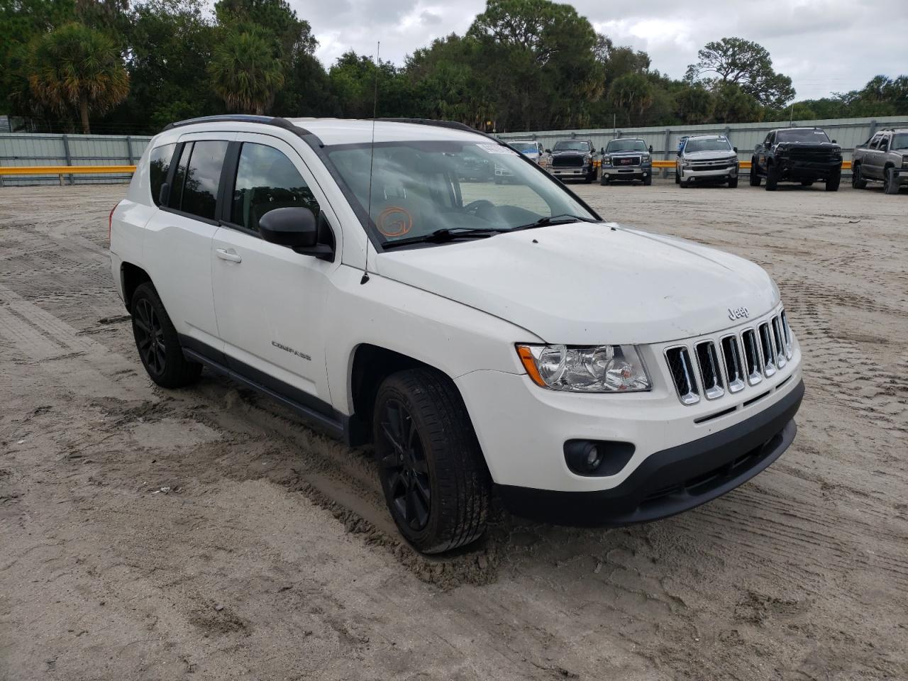 JEEP COMPASS LA 2012 with VIN 1C4NJCEB0CD704419 - Photo from auction
