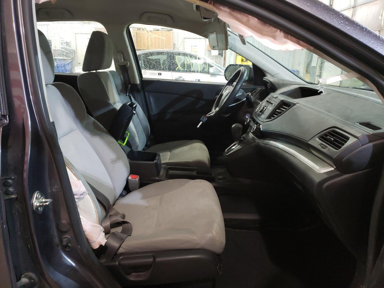 Photo 5 from auction – 2016 HONDA CR-V LX with VIN 2HKRM3H38GH566691