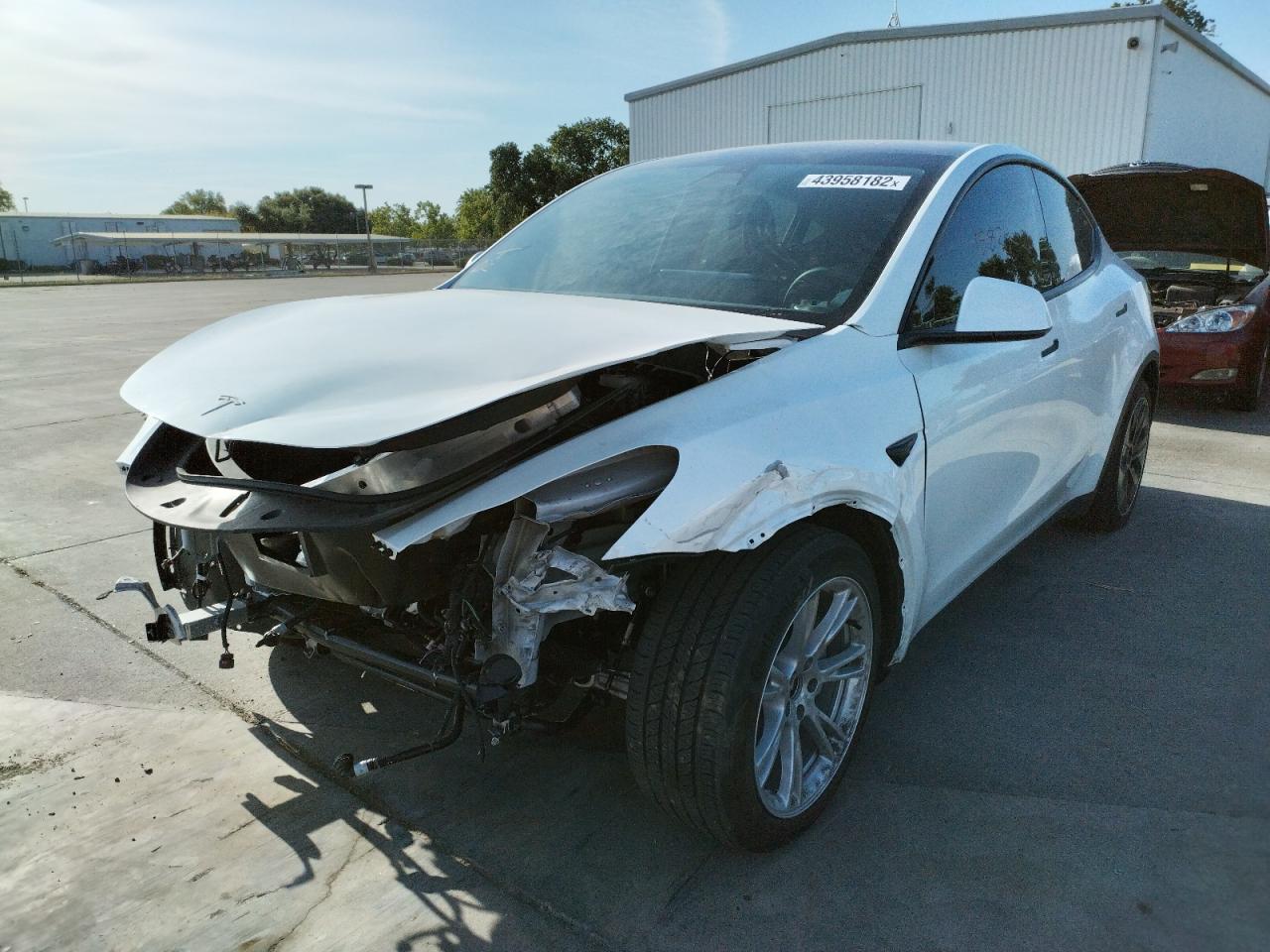 Photo 2 from auction – 2020 TESLA MODEL Y with VIN 5YJYGDEE3LF010571