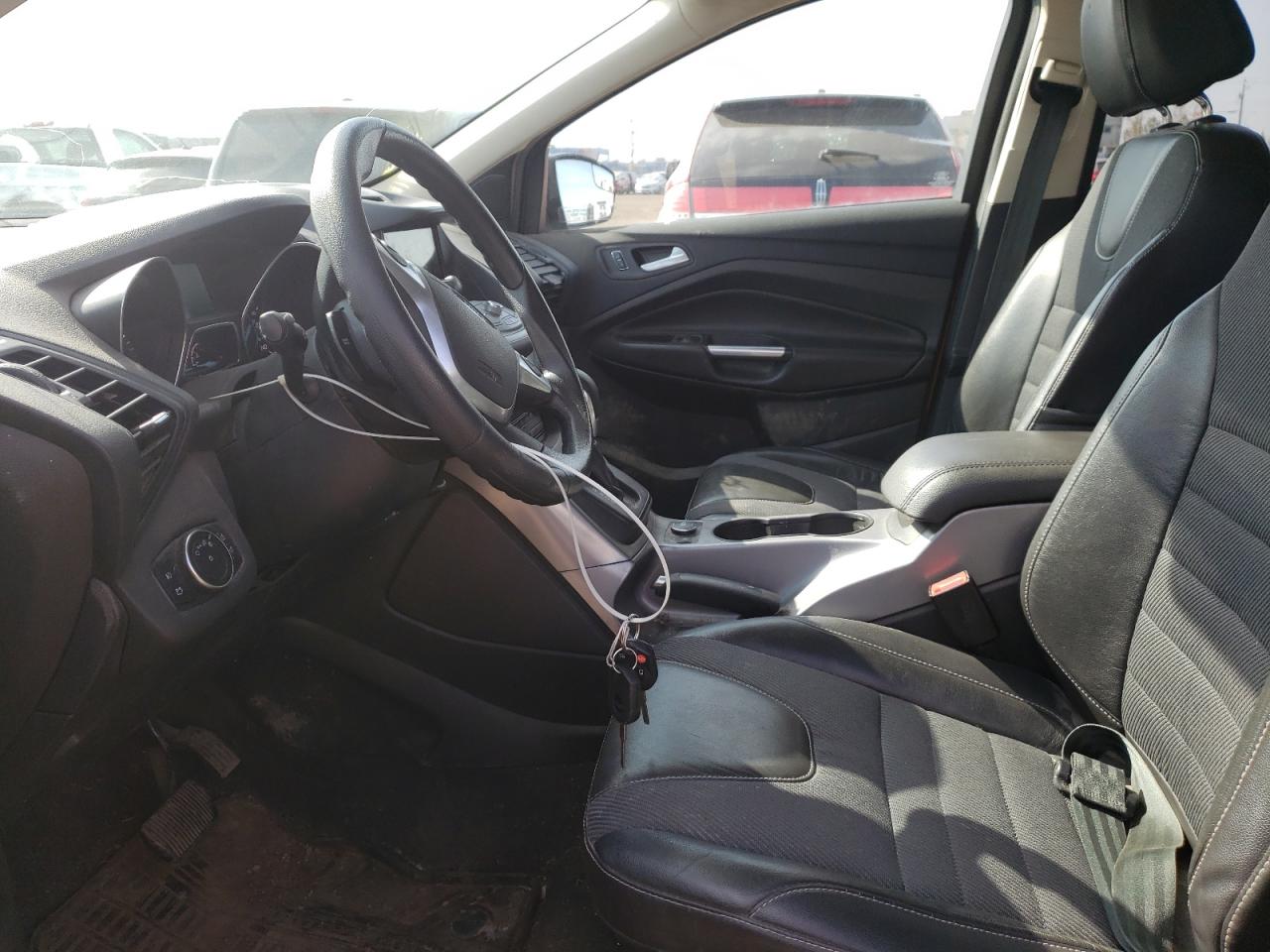 Photo 5 from auction – 2016 FORD ESCAPE SE with VIN 1FMCU9GX0GUC47350