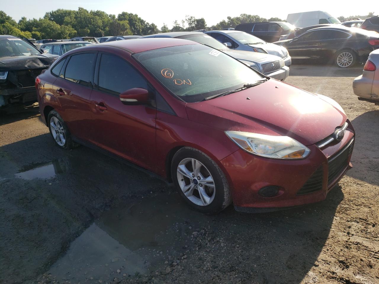 FORD FOCUS SE 2014 with VIN 1FADP3F2XEL417113 - Photo from auction