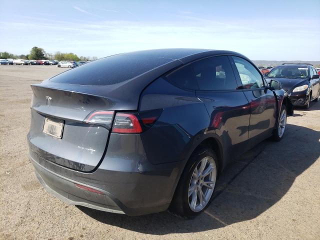 Photo 7 from auction – 2021 TESLA MODEL Y with VIN 5YJYGDEE2MF146322