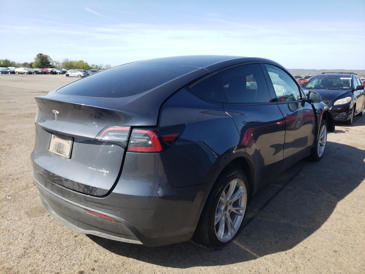 Photo 17 from auction – 2021 TESLA MODEL Y with VIN 5YJYGDEE2MF146322