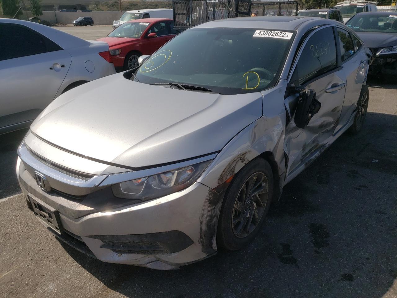 Photo 2 from auction – 2017 HONDA CIVIC EX with VIN 2HGFC2F7XHH528252