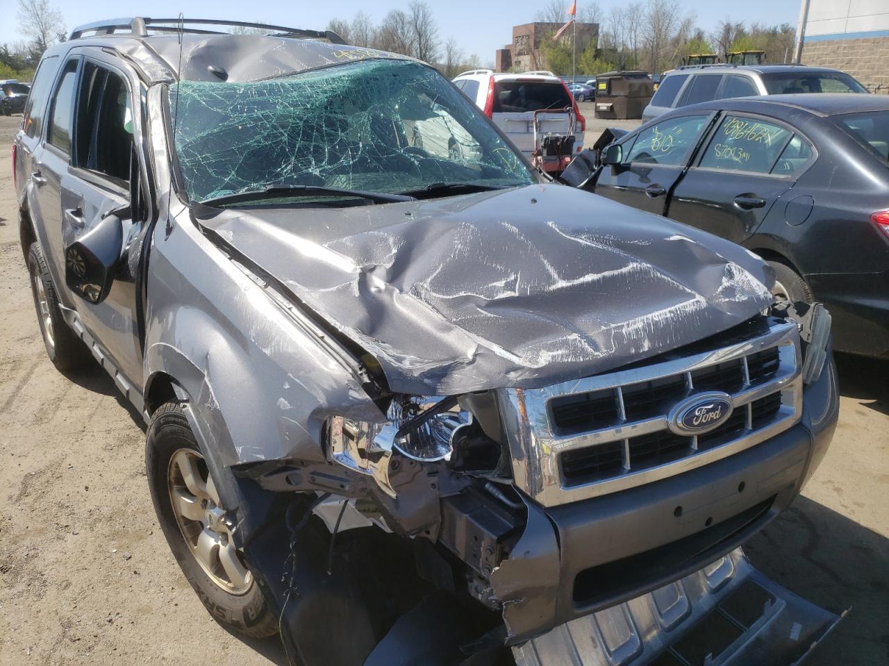 FORD ESCAPE LIM 2011 with VIN 1FMCU9EG7BKB56647 - Photo from auction