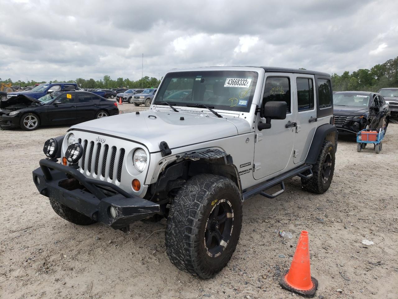 Photo 2 from auction – 2011 JEEP WRANGLER U with VIN 1J4BA3H11BL518019