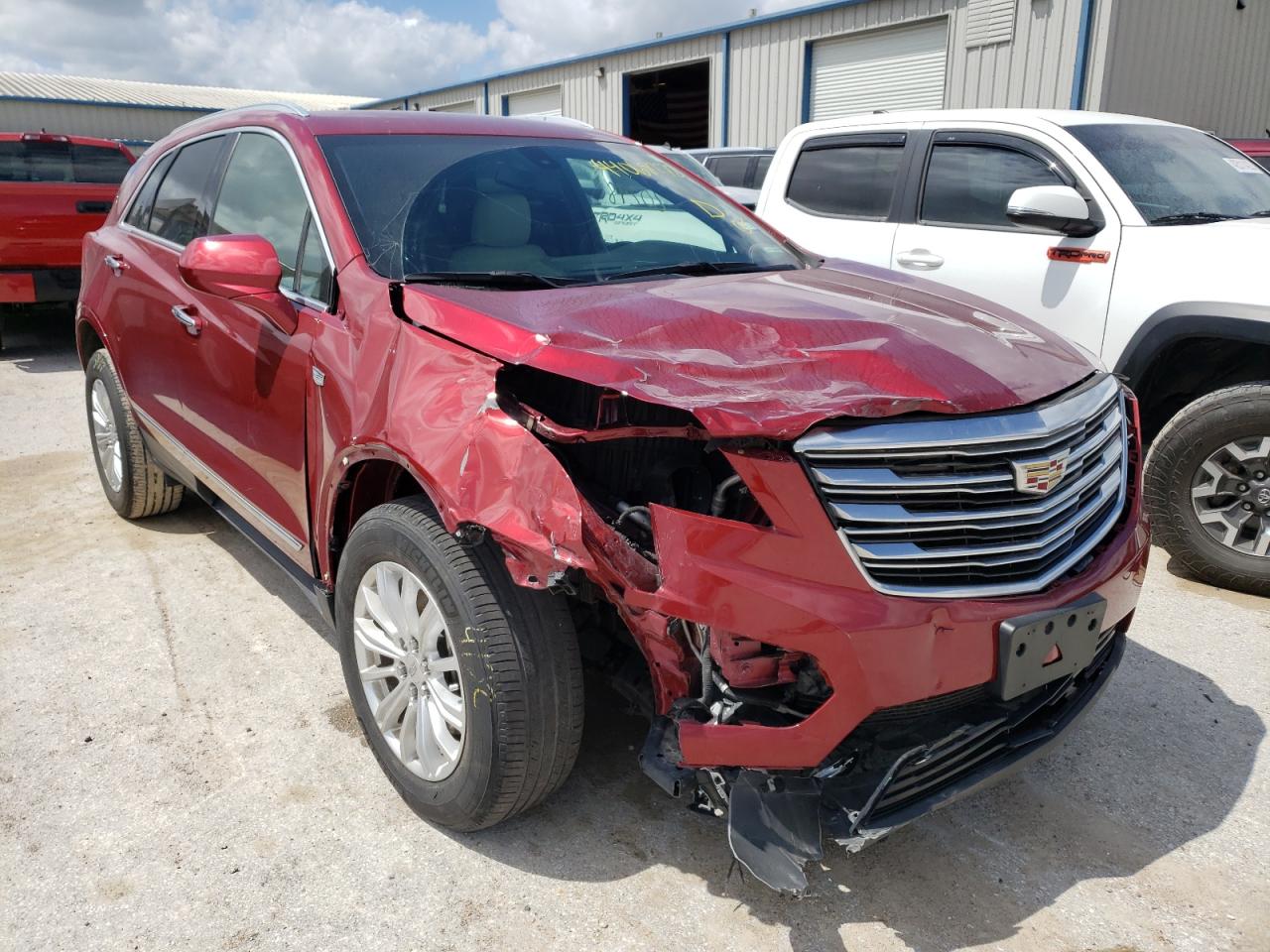 CADILLAC XT5 2019 with VIN 1GYKNARS9KZ171939 - Photo from auction