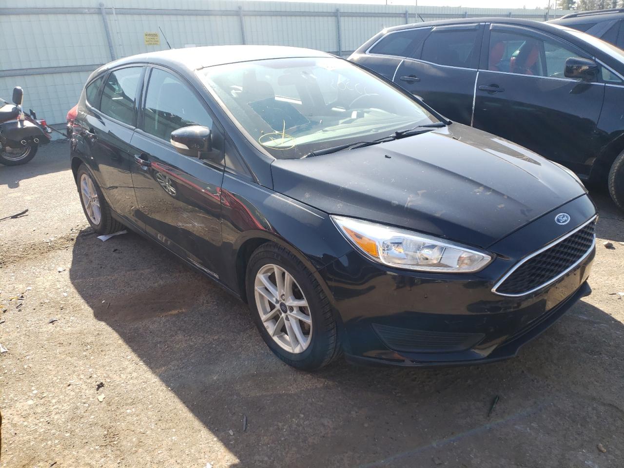 FORD FOCUS SE 2017 with VIN 1FADP3K20HL232918 - Photo from auction
