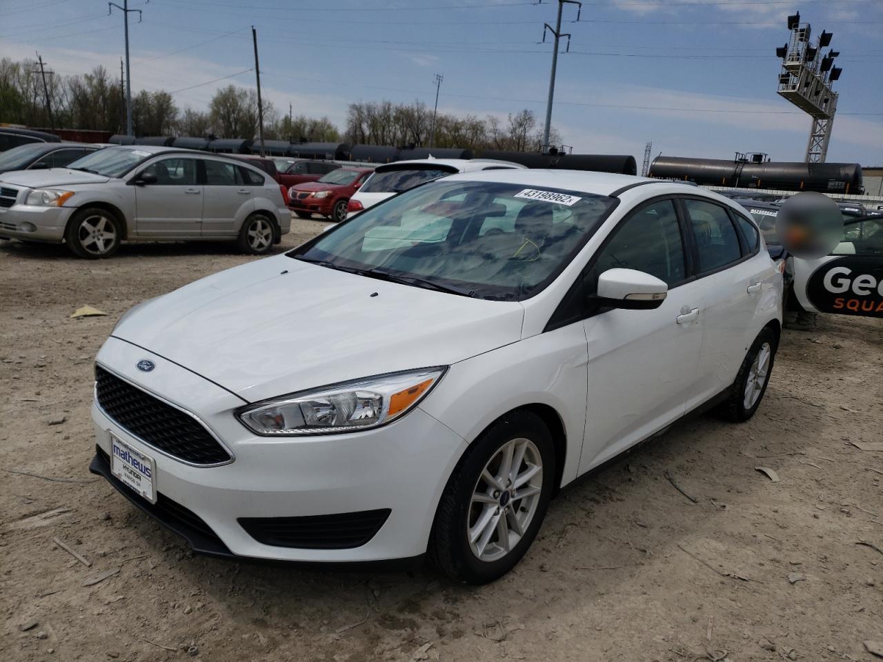 Photo 2 from auction – 2017 FORD FOCUS SE with VIN 1FADP3K22HL218969