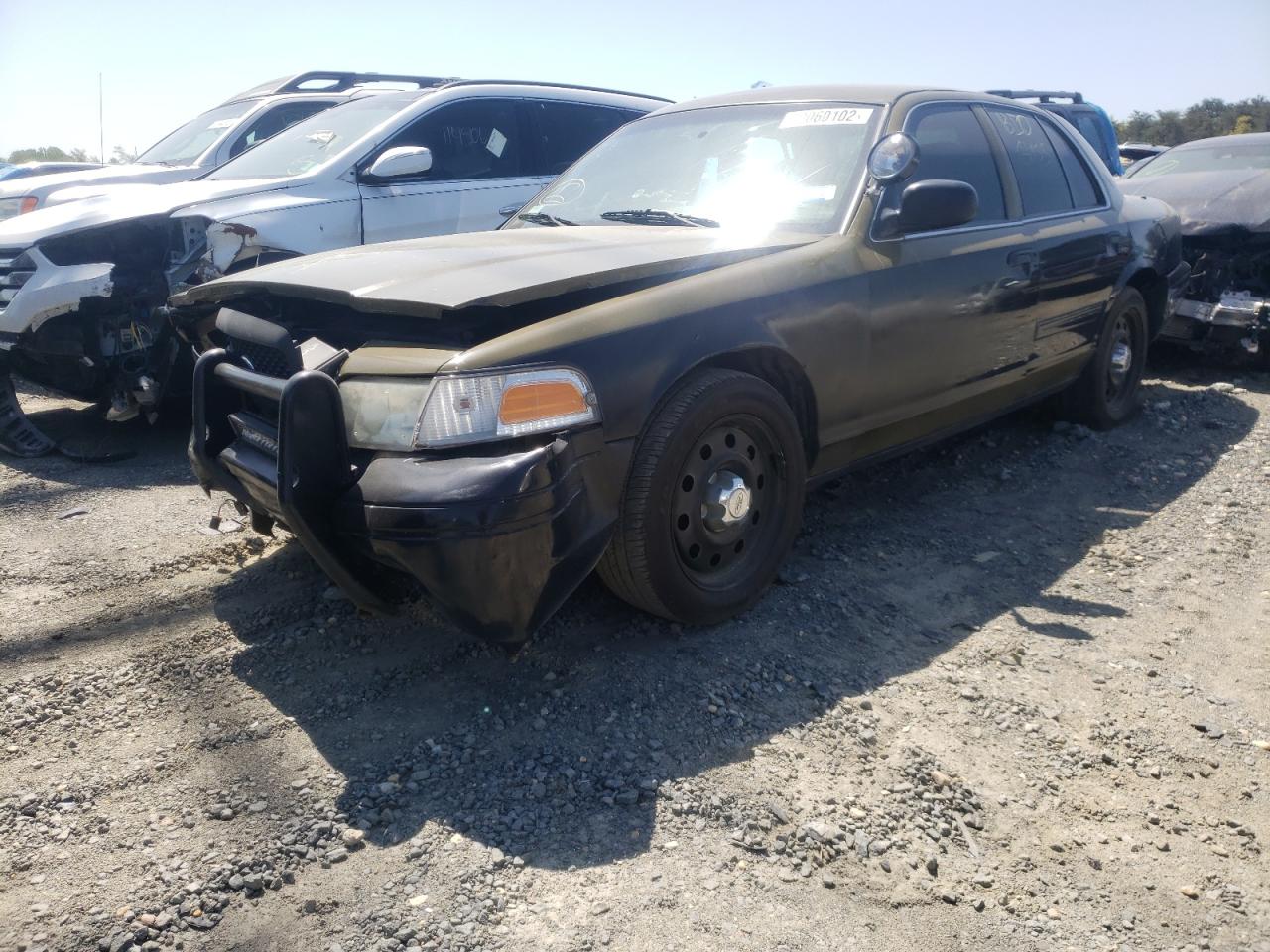 Photo 2 from auction – 2011 FORD CROWN VICT with VIN 2FABP7BV6BX142269