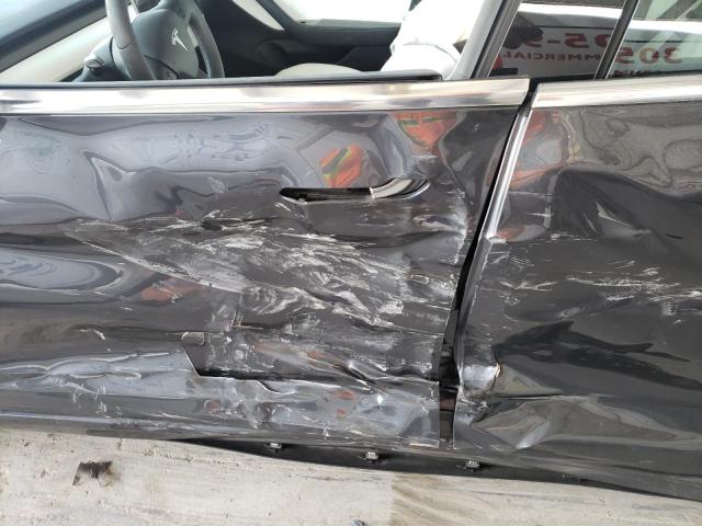 Photo 10 from auction – 2019 TESLA MODEL 3 with VIN 5YJ3E1EBXKF469745