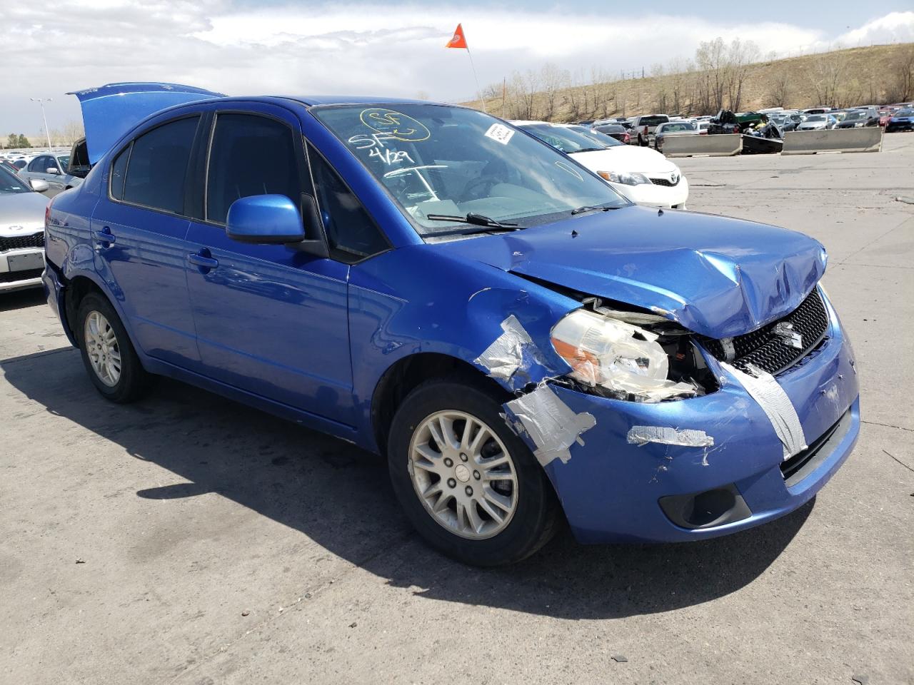 Фото 1 с аукциона – 2012 SUZUKI SX4 LE с VIN JS2YC5A35C6305131