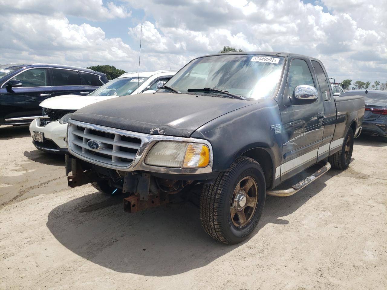 Photo 2 from auction – 1999 FORD F150 with VIN 2FTRX17L4XCA79474