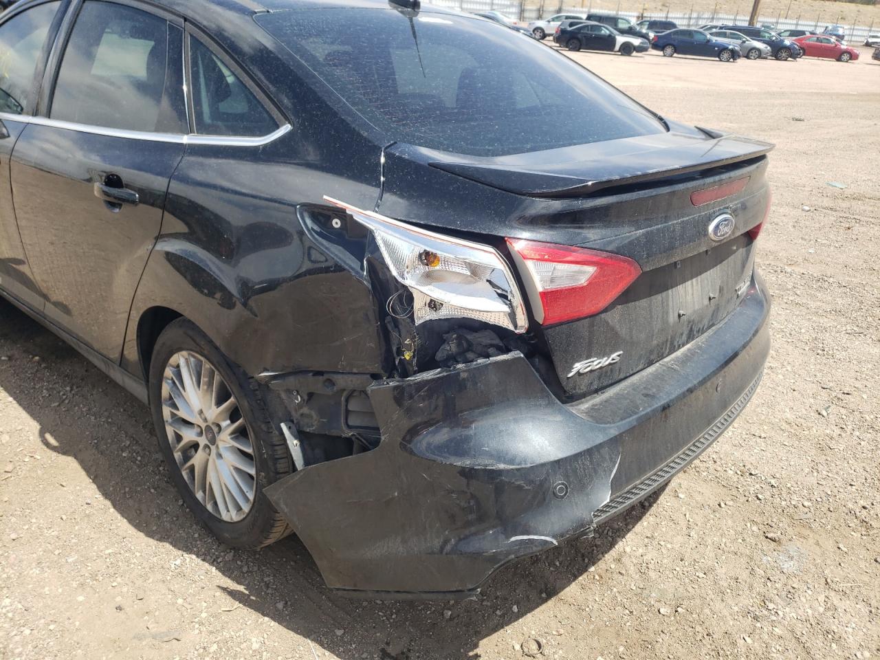 Photo 9 from auction – 2014 FORD FOCUS TITA with VIN 1FADP3J22EL276299