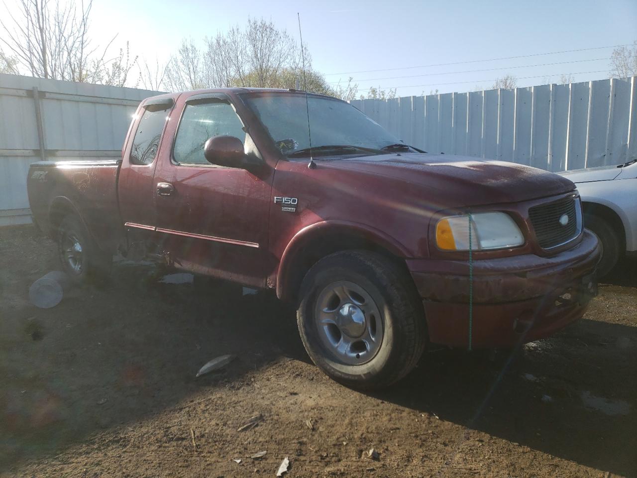 Photo 9 from auction – 2003 FORD F150 with VIN 2FTRX18L23CA50144