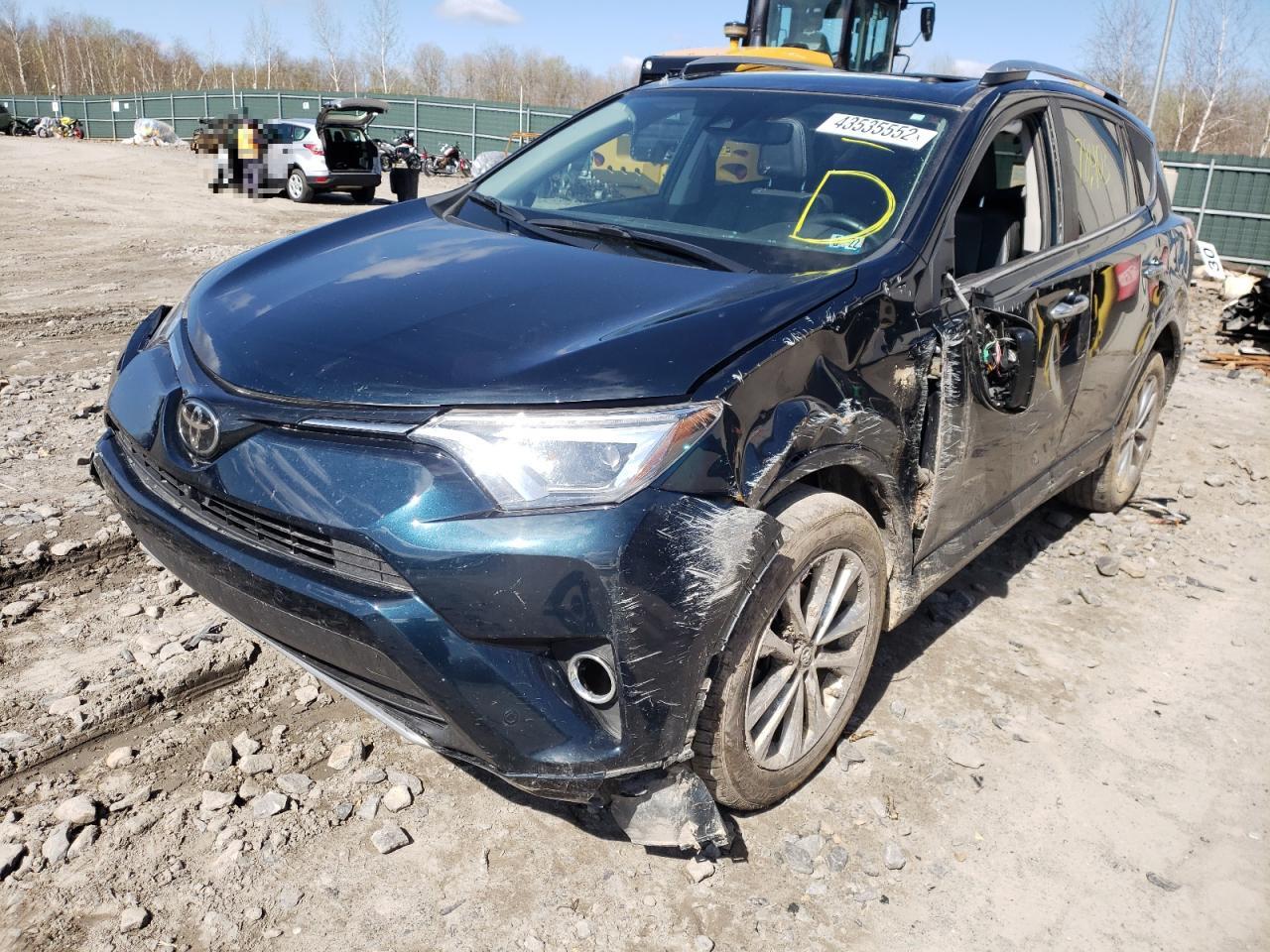 Photo 2 from auction – 2017 TOYOTA RAV4 LIMIT with VIN 2T3DFREV3HW561048