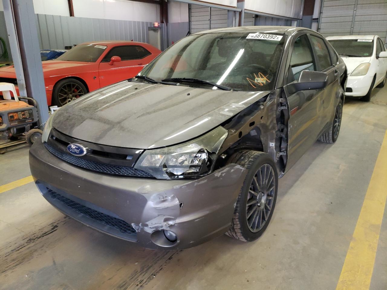 Photo 2 from auction – 2011 FORD FOCUS SES with VIN 1FAHP3GN1BW140324