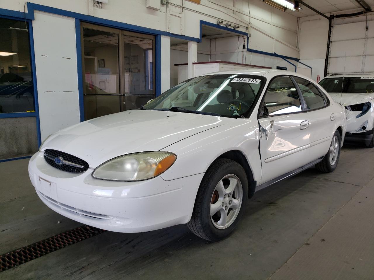 Photo 2 from auction – 2002 FORD TAURUS SE with VIN 1FAFP53U02G101623