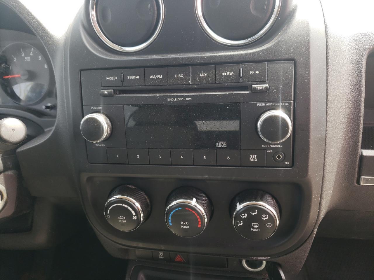 Photo 9 from auction – 2011 JEEP COMPASS SP with VIN 1J4NT1FA7BD267175