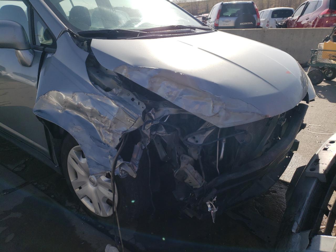 Photo 9 from auction – 2011 NISSAN VERSA S with VIN 3N1BC1CP5BL389838