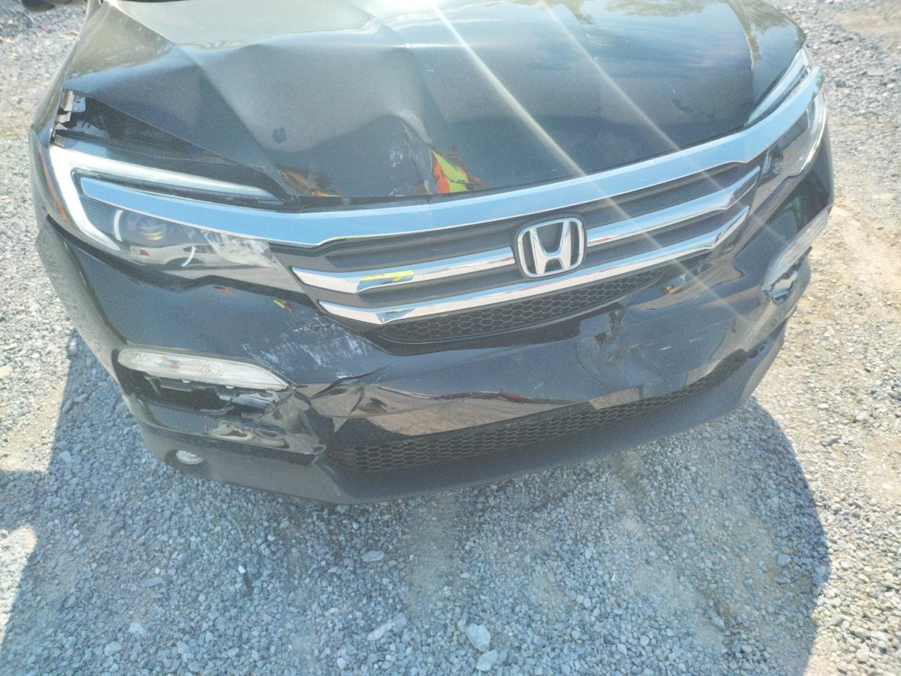 Photo 9 from auction – 2017 HONDA PILOT EXL with VIN 5FNYF5H5XHB001961