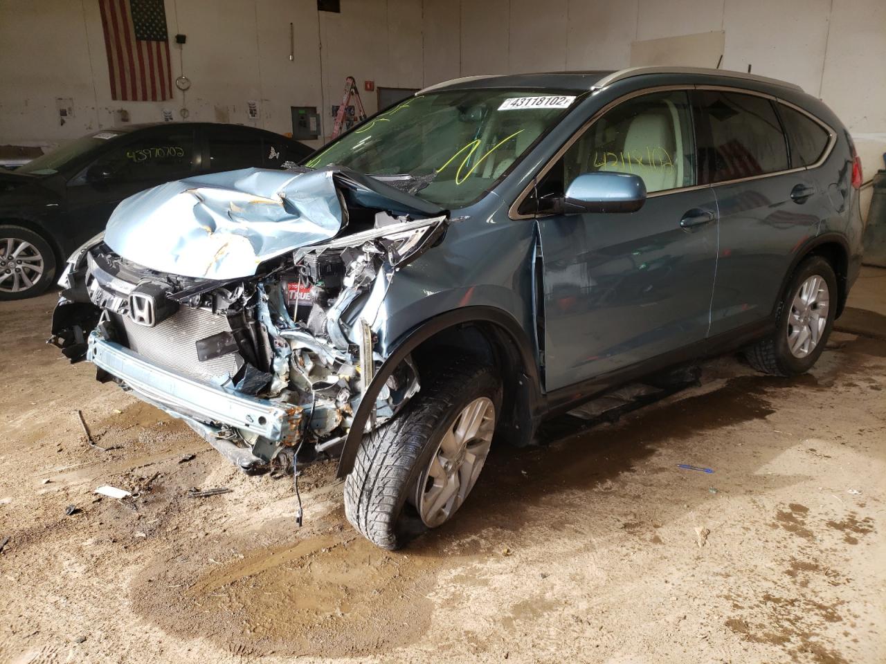 Photo 14 from auction – 2015 HONDA CR-V EXL with VIN 2HKRM4H79FH660540