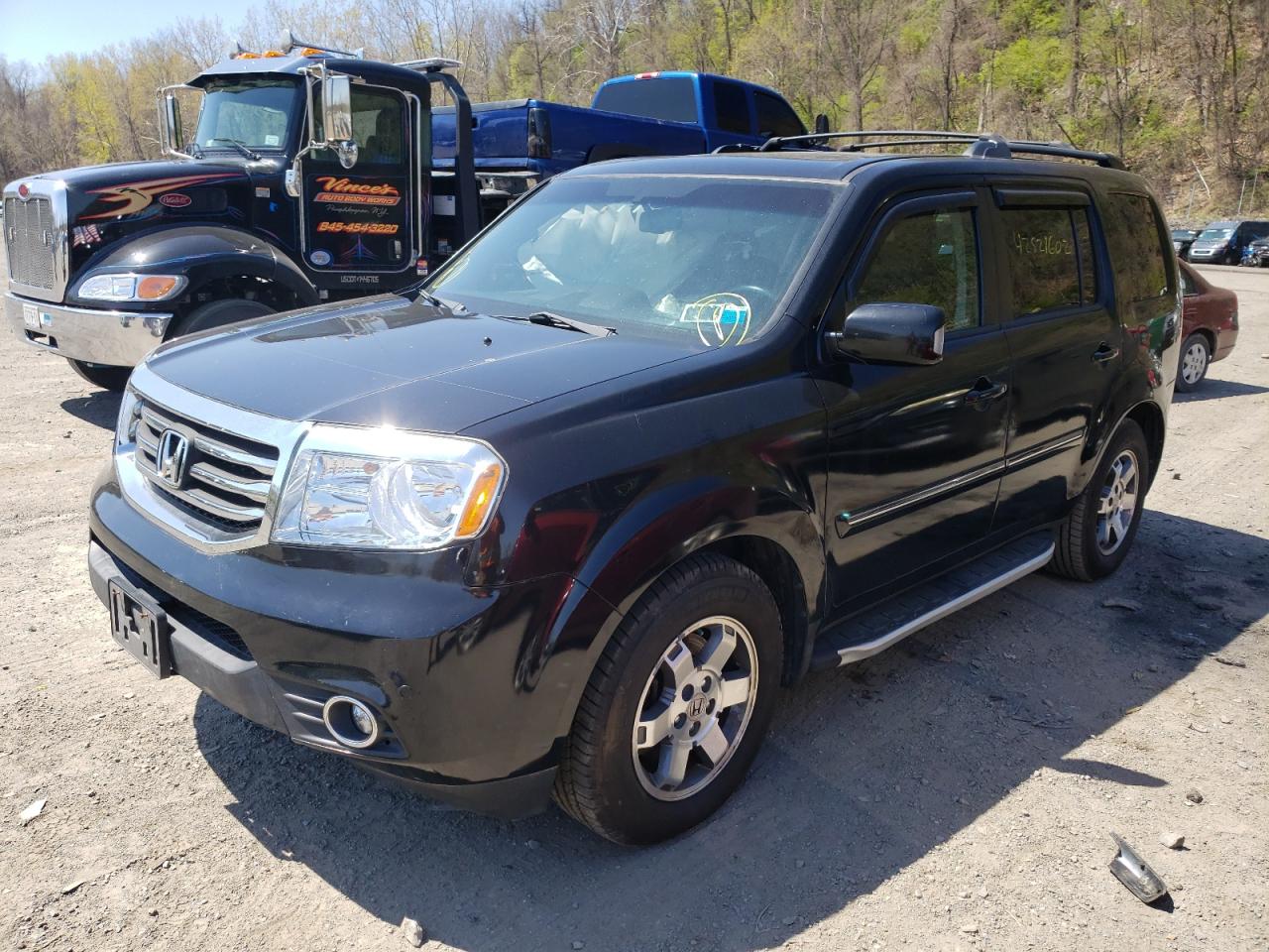 Photo 2 from auction – 2011 HONDA PILOT TOUR with VIN 5FNYF4H92BB025515