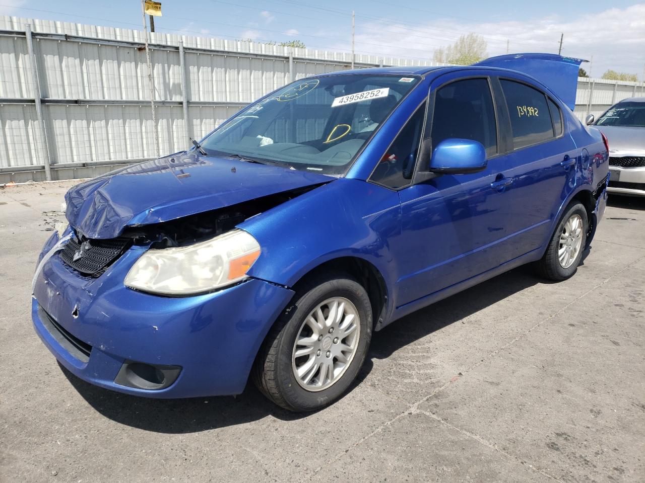 Фото 2 с аукциона – 2012 SUZUKI SX4 LE с VIN JS2YC5A35C6305131