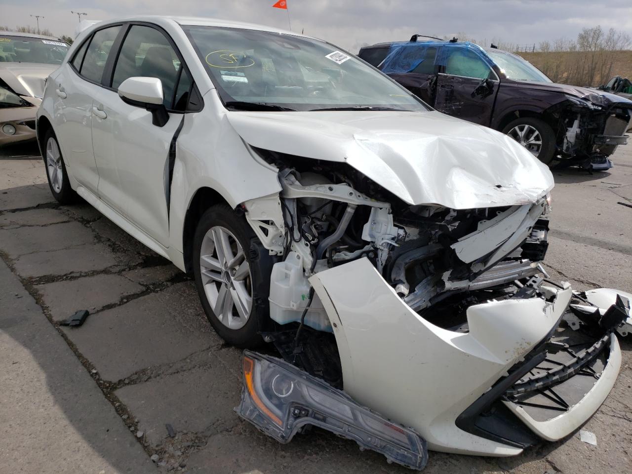 TOYOTA COROLLA SE 2019 with VIN JTNK4RBEXK3040609 - Photo from auction