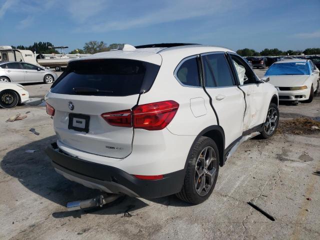 Photo 4 from auction – 2019 BMW X1 SDRIVE2 with VIN WBXHU7C58K3H44587